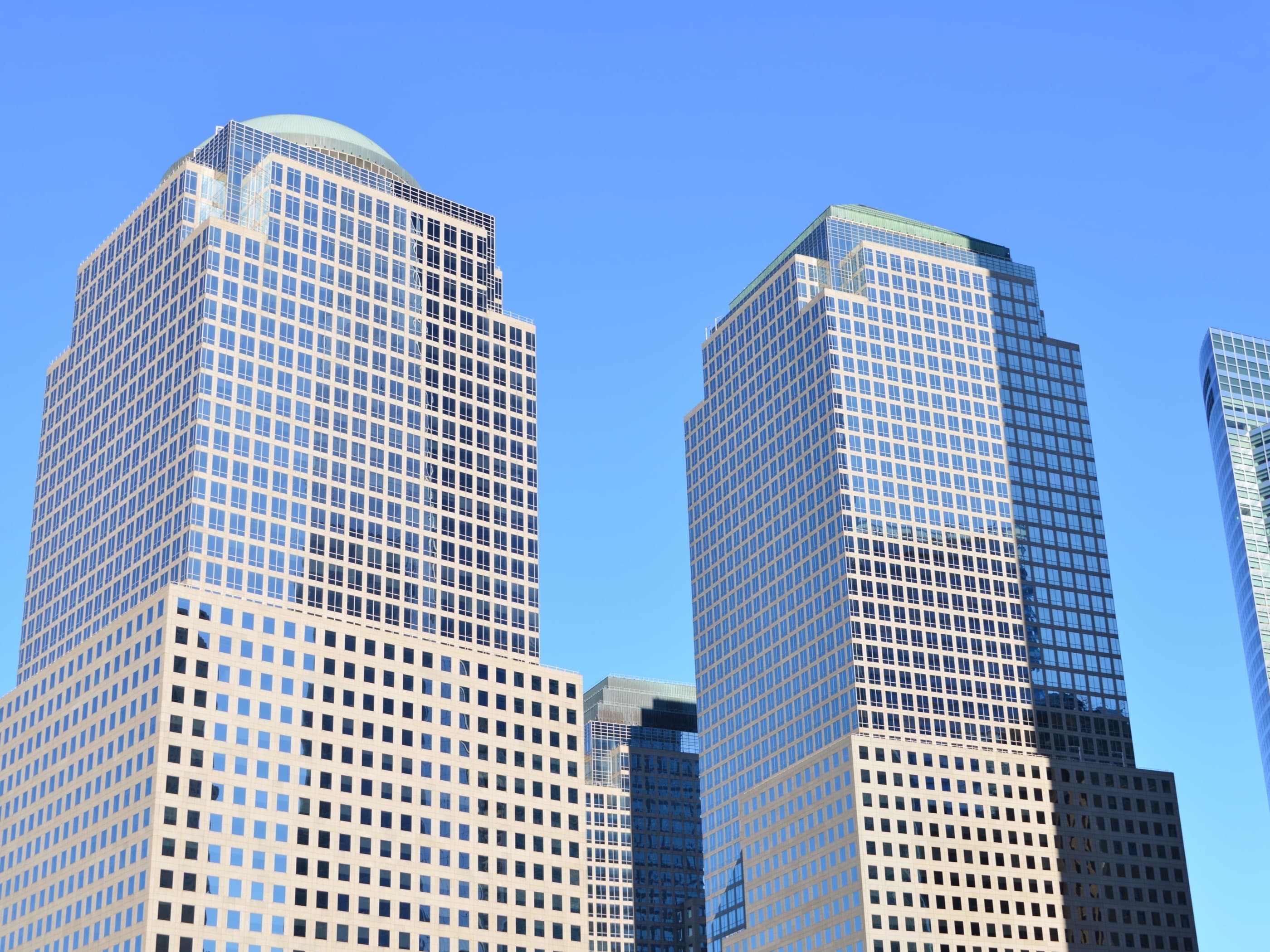 Office towers in a financial district, seen from below